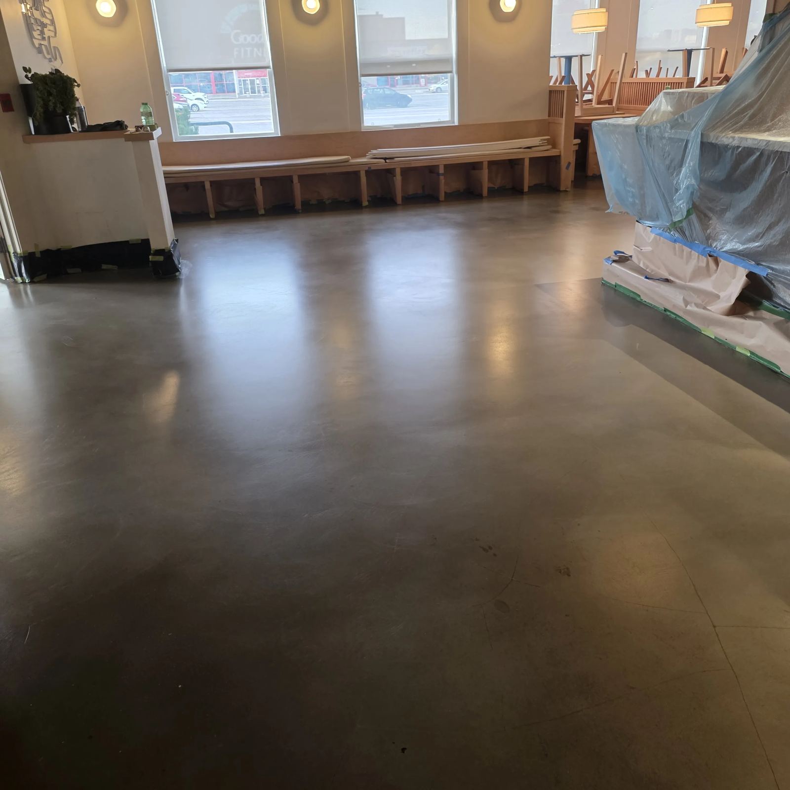 Polished concrete floor in cafe hospitality space