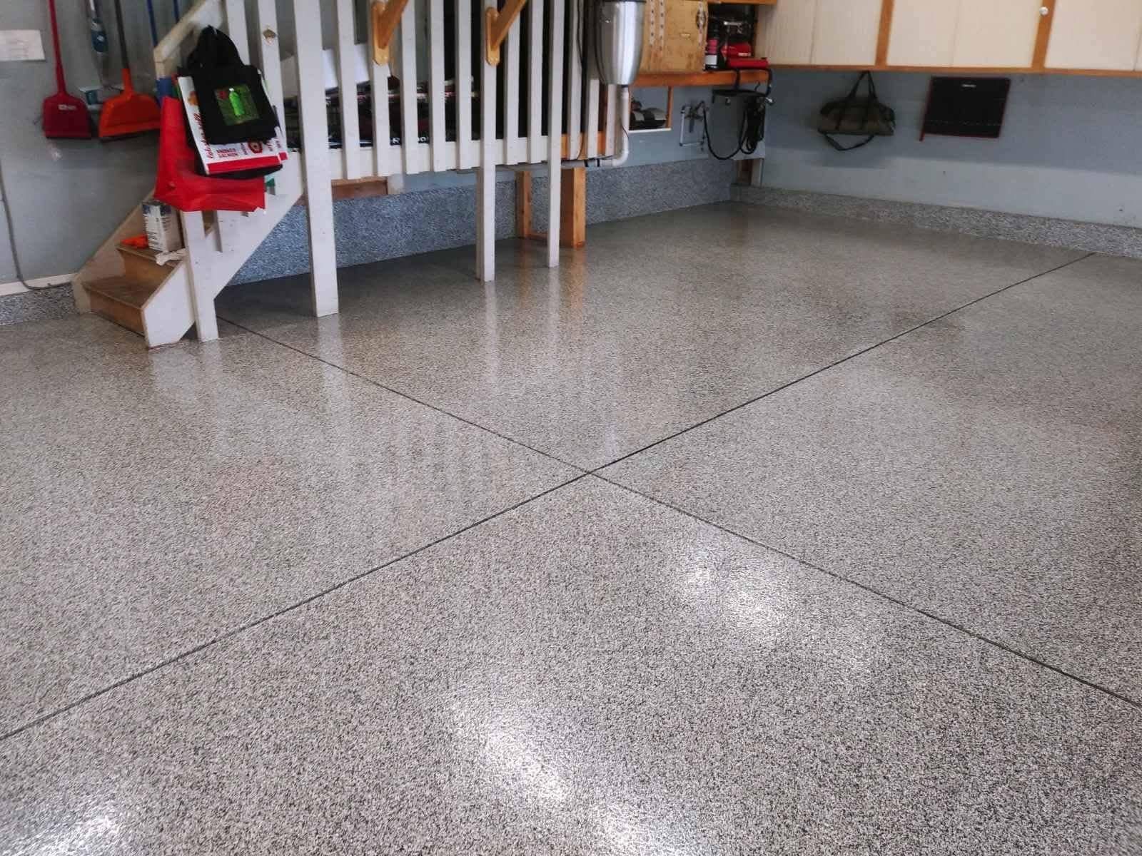 Flake epoxy garage floor with crisp saw-cut control joints