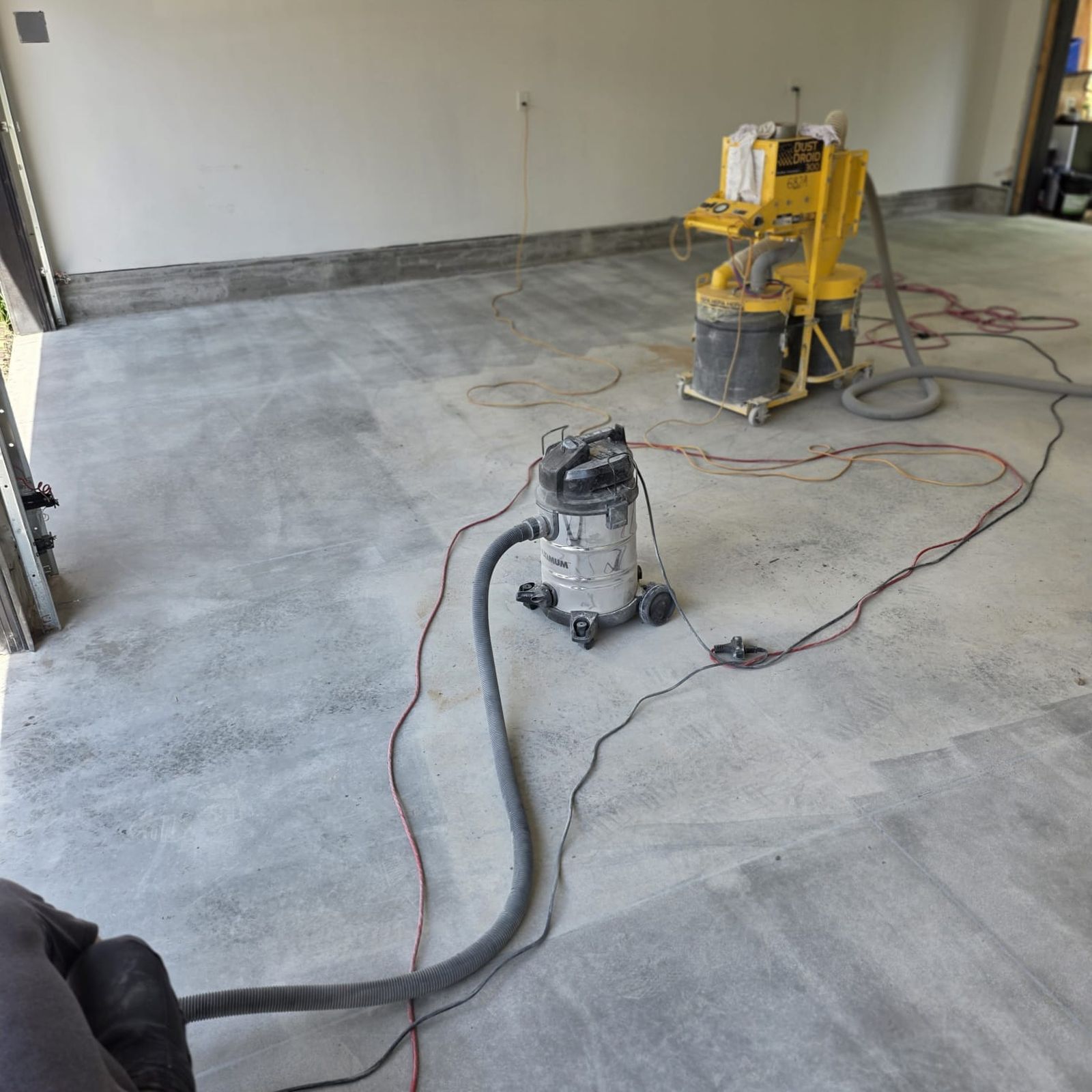 Dust Droid surface preparation equipment on a Res-Tech job site