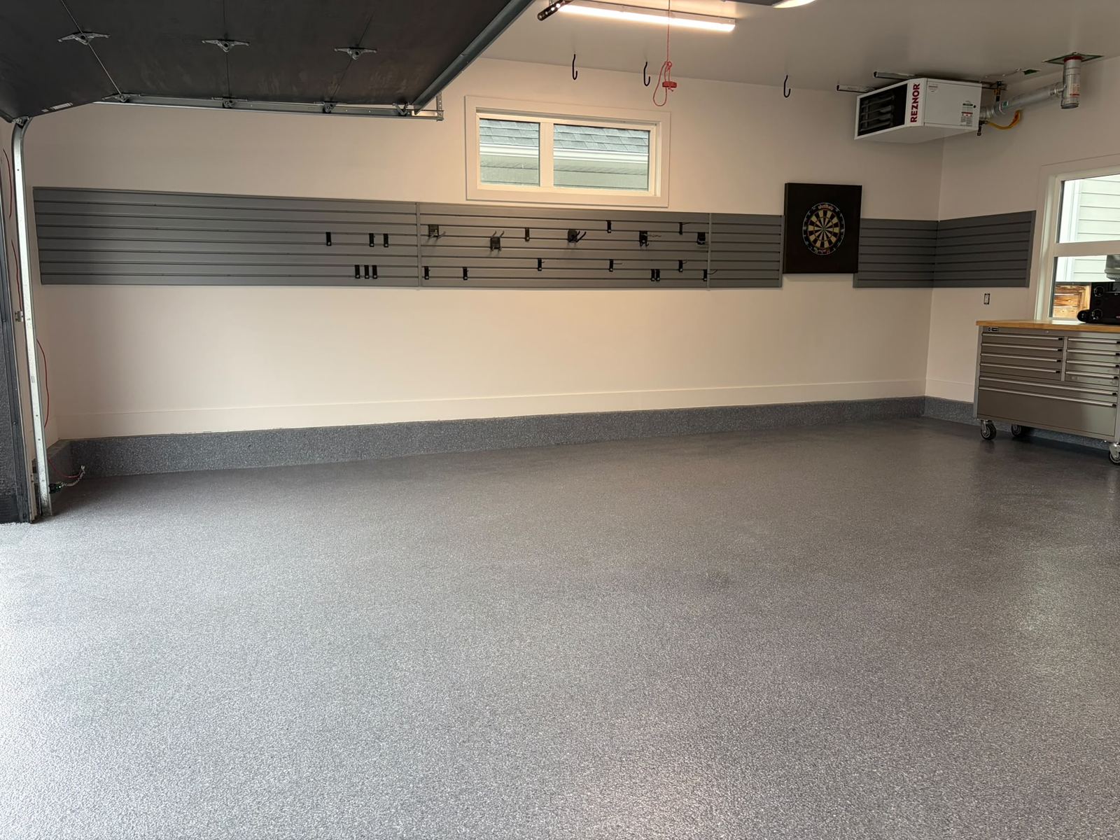 Grey flake garage with slatwall storage